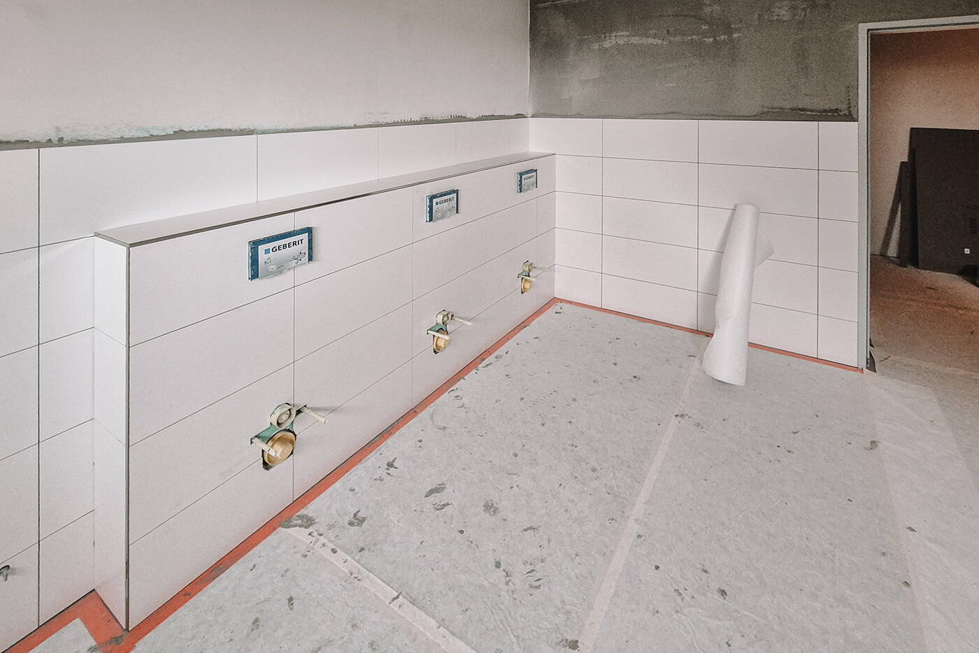 sanierung_roggliswil_schulareal_plattenleger_wc.jpg